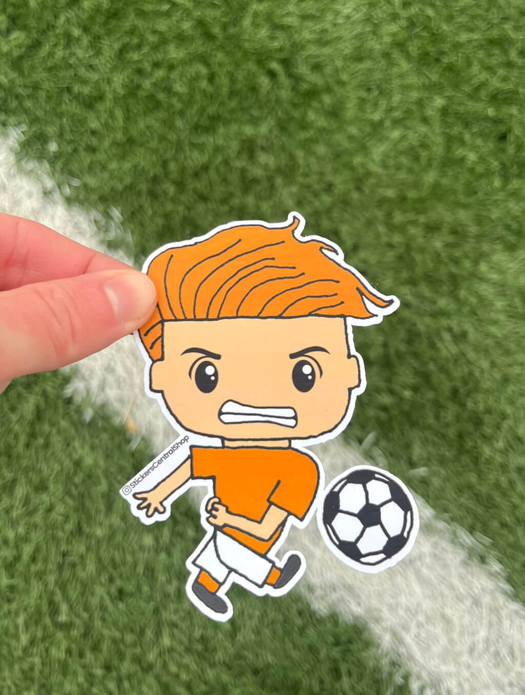 Shooting Soccer Player Sticker, orange and white