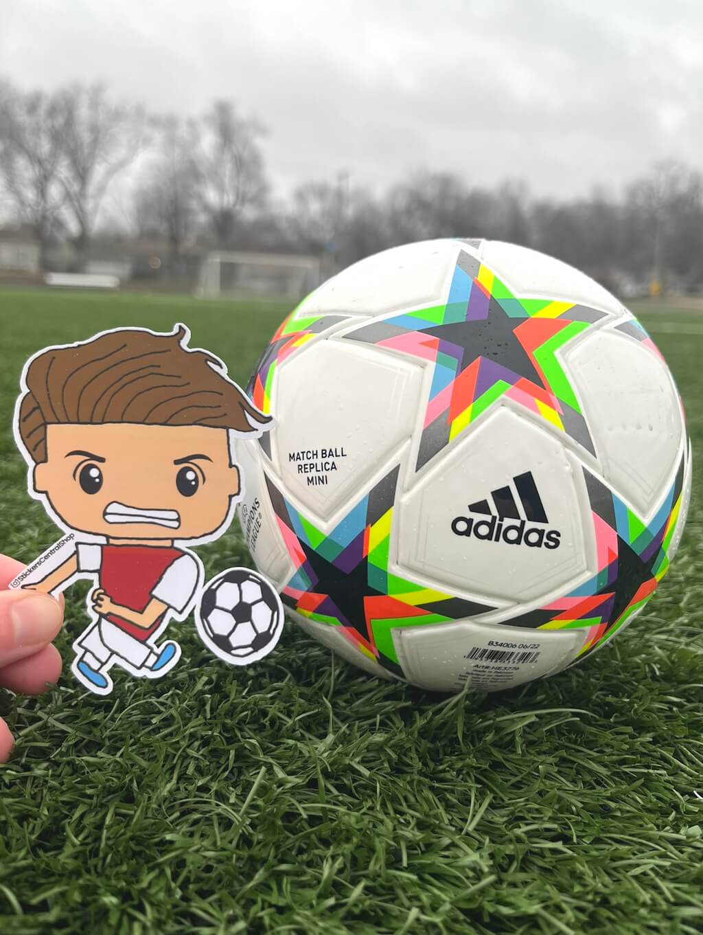 Arsenal Shooting Soccer Player Sticker, red with white