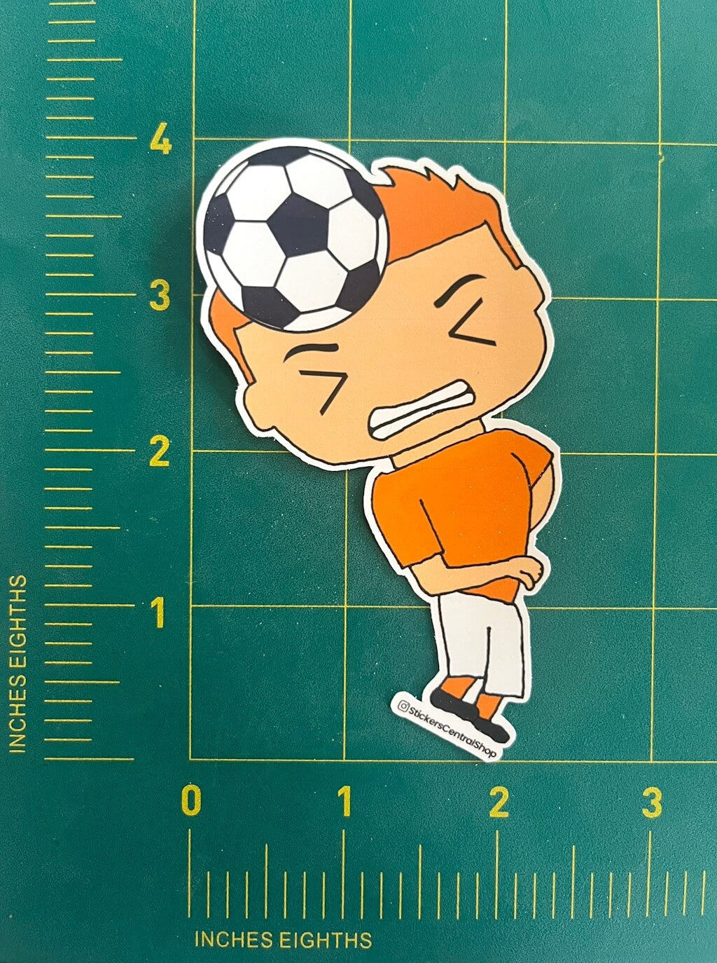 Header Soccer Player Sticker, orange and white