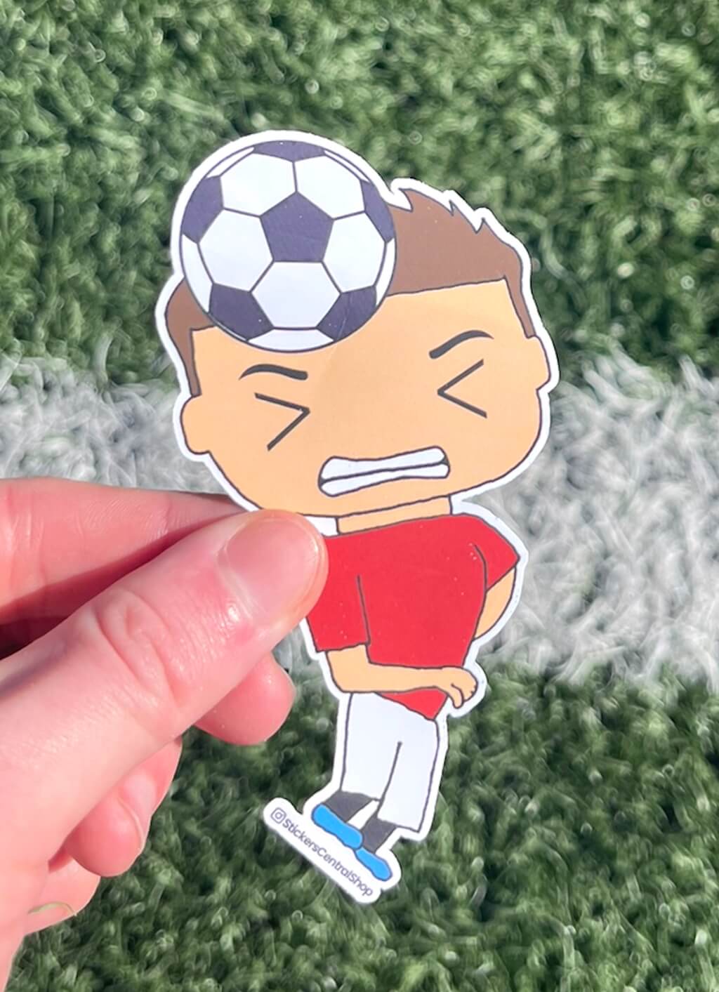 Manchester United Header Soccer Player Sticker, red with white