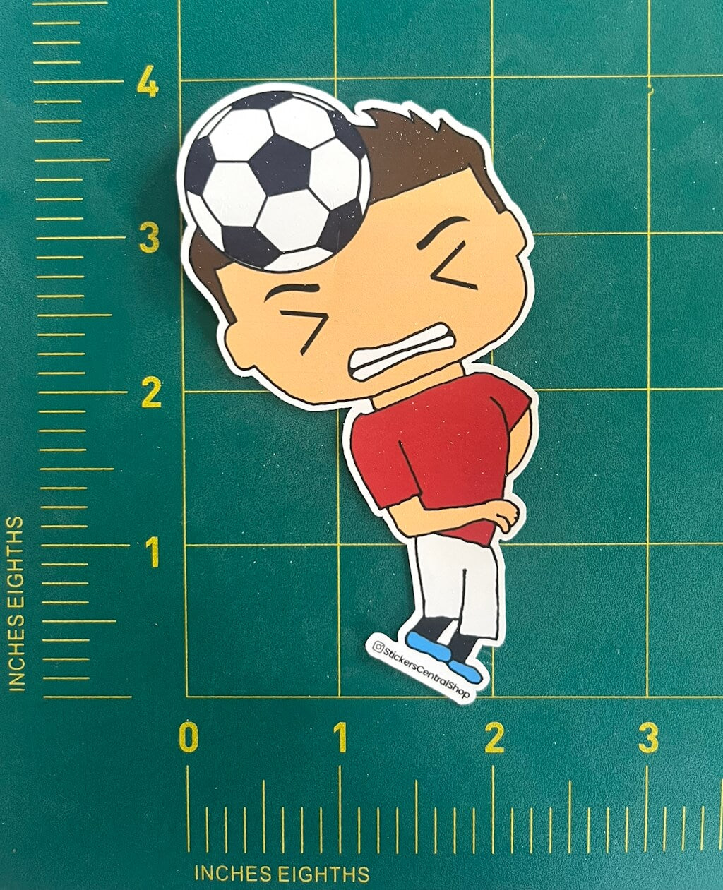 Manchester United Header Soccer Player Sticker, red with white