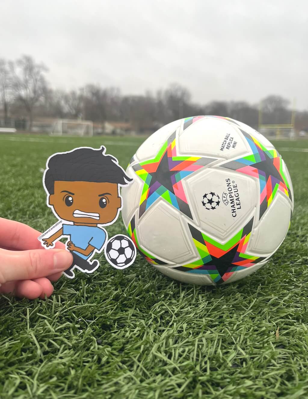 Uruguay Shooting Soccer Player Sticker, light blue and black