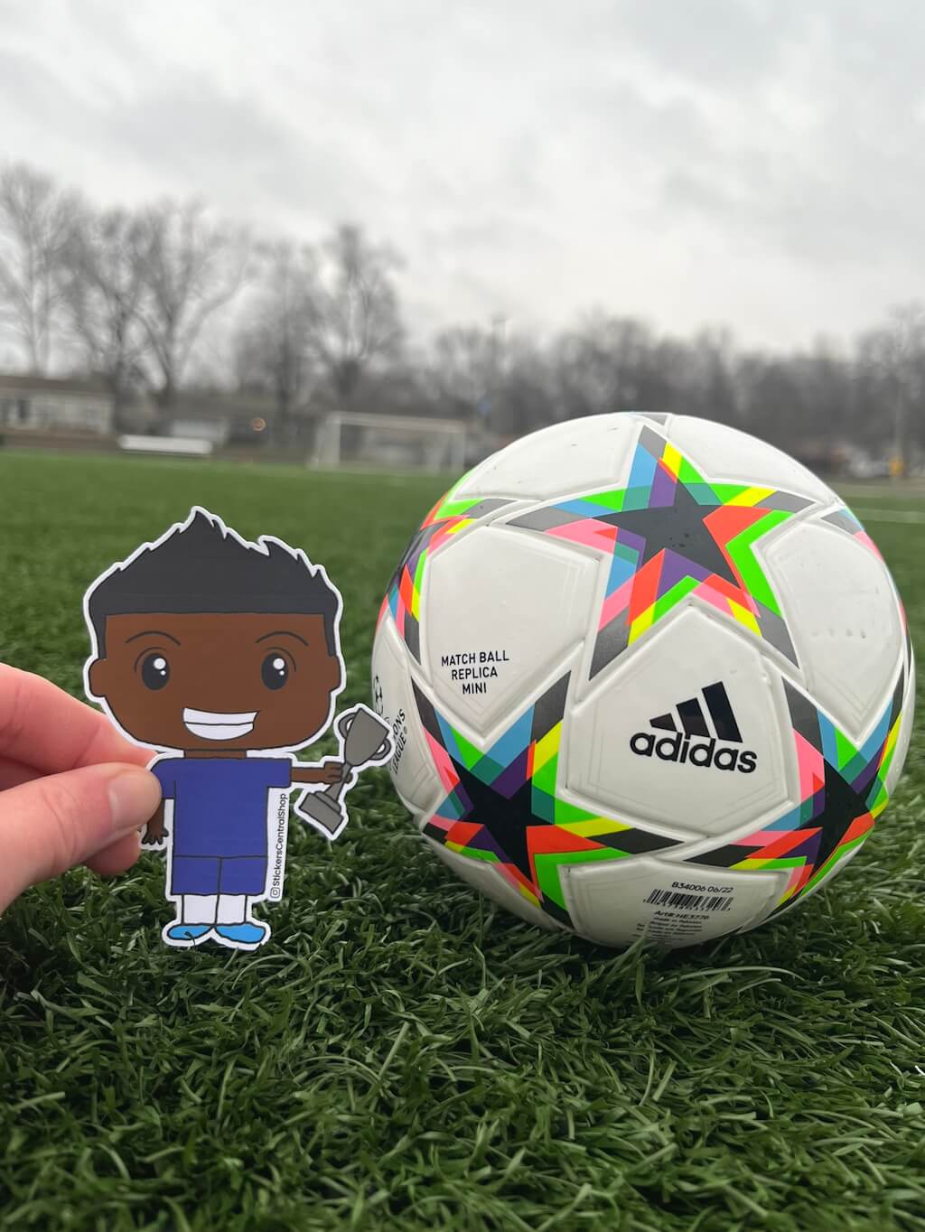 Champion Soccer Player Sticker, blue with trophy