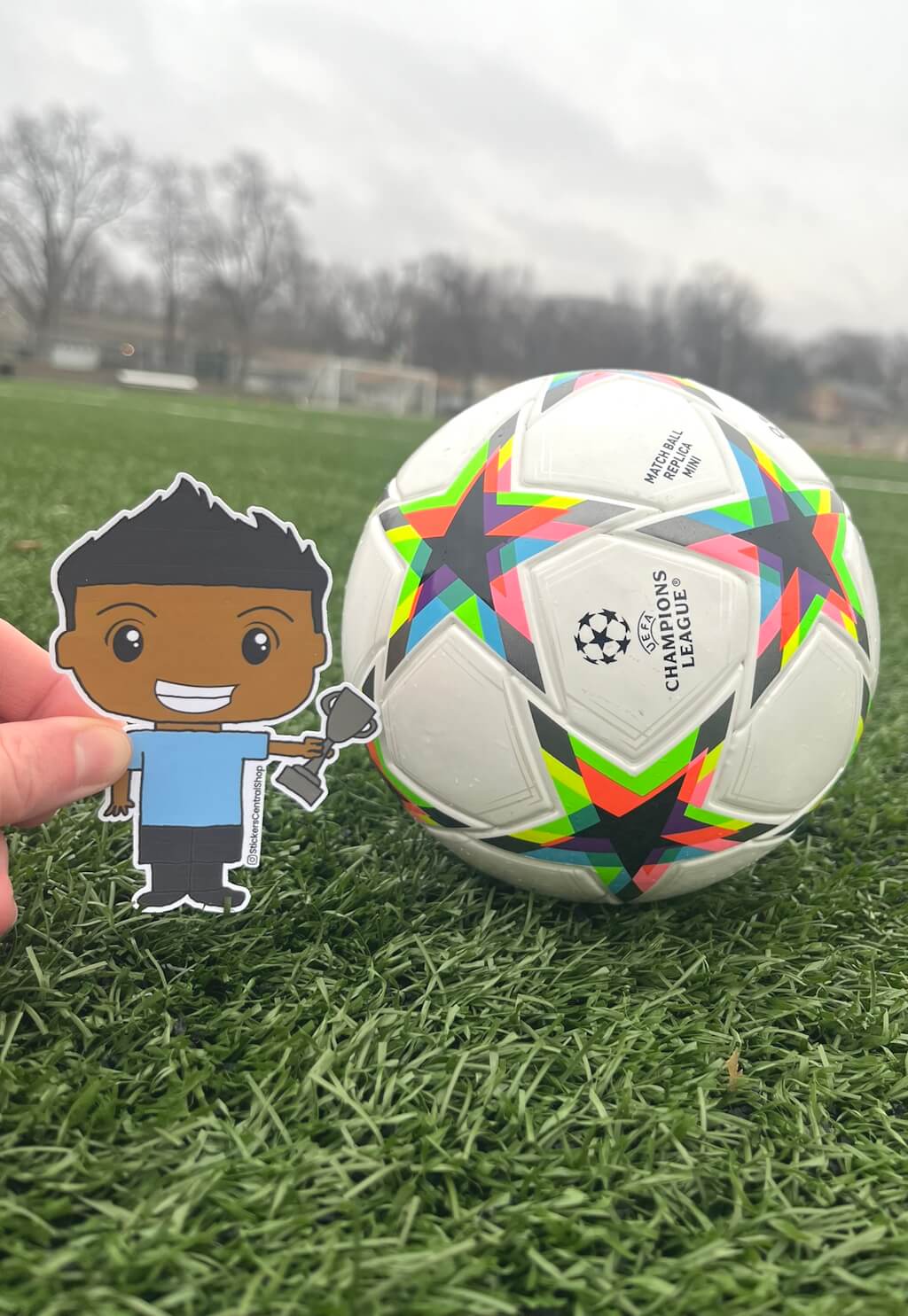 Uruguay Champions Soccer Player Sticker, light blue and black with trophy