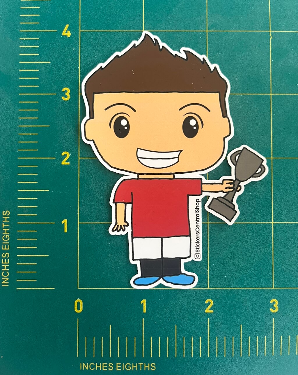 Manchester United Champions Soccer Player Sticker, red and white with trophy