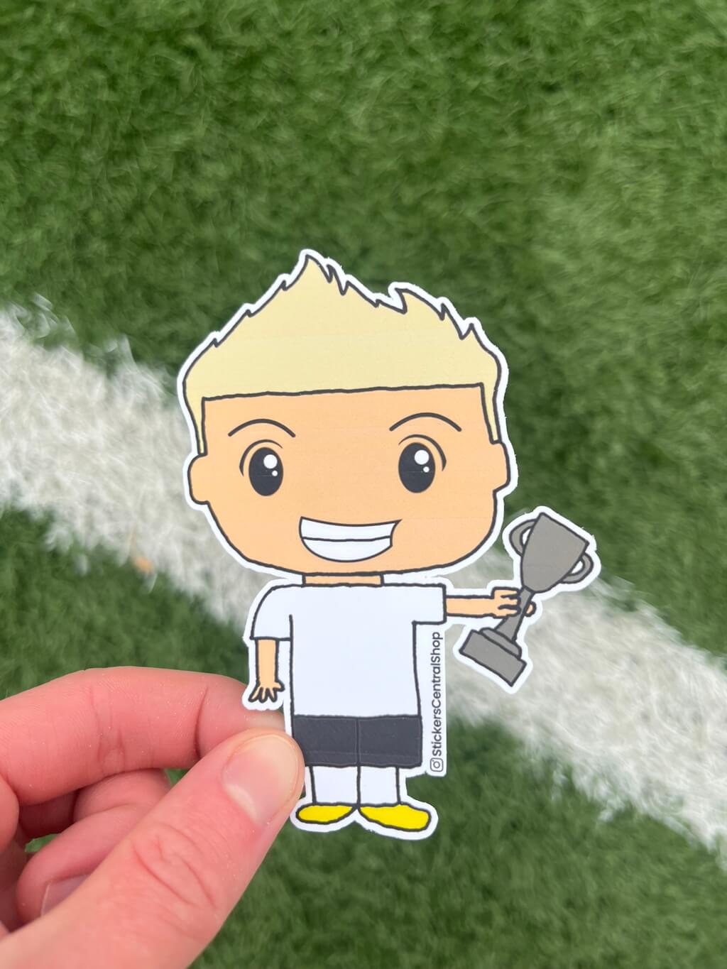 Champion Soccer Player Sticker, white and black with trophy