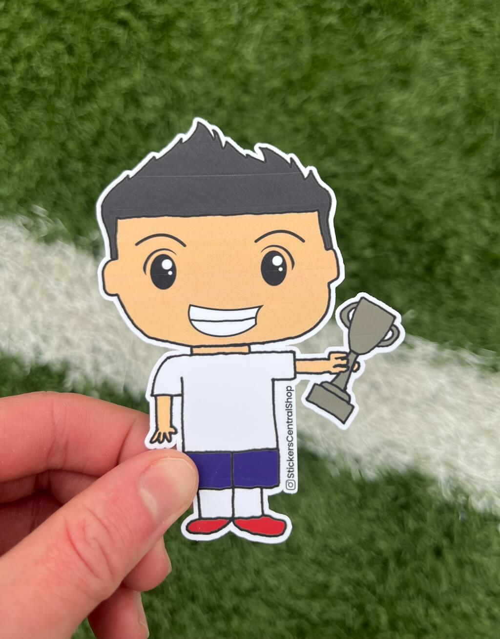 Champion Soccer Player Sticker, white and blue with trophy